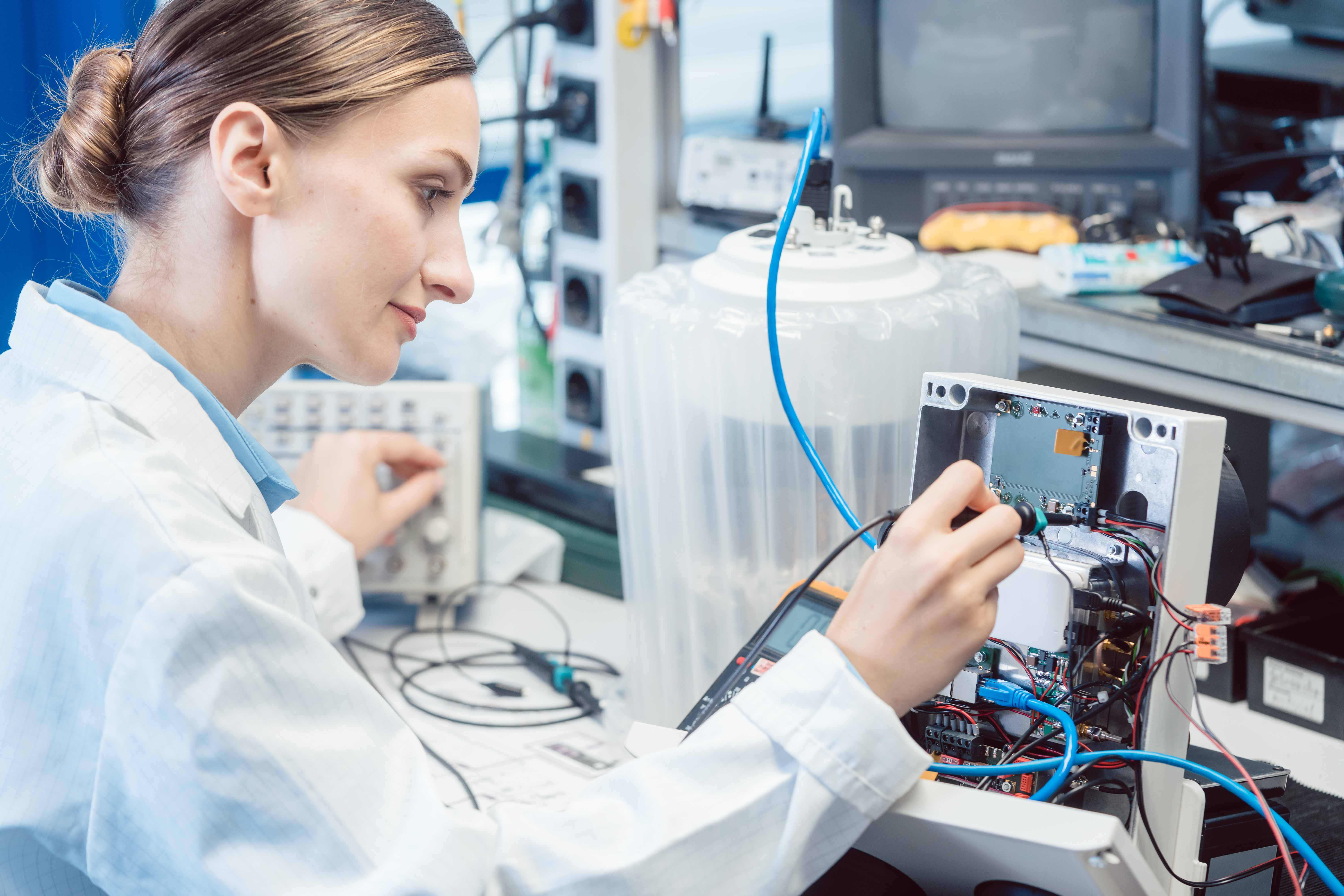 A women testing electrical equipment